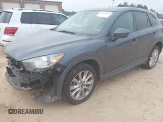2013 Mazda CX-5 Grand Touring with VIN JM3KE4DE2D0164225, listed as a IAAI auction lot 41663412 with 162,738 mi miles. Bid and sale history available at carsss.com. Image 2.