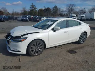 2021 Mazda Mazda6 Touring with VIN JM1GL1VM8M1615516, listed as a IAAI auction lot 41531402 with 59,585 mi miles. Bid and sale history available at carsss.com. Image 2.