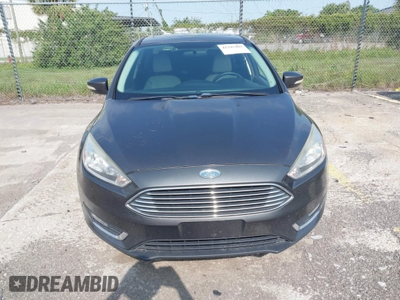 2018 Ford Focus Titanium с VIN 1FADP3J23JL272028, выставлен на аукционе IAAI как лот 42395402 с пробегом 125 975 миль миль и . История ставок и продаж доступна на DreamBid. Изображение 13.