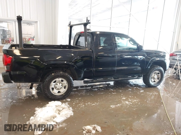 2023 Toyota Tacoma SR with VIN 3TYRX5GN2PT069110, listed as a IAAI auction lot 41235858 with 60,019 mi miles and . Bid and sale history available at DreamBid. Image 13.