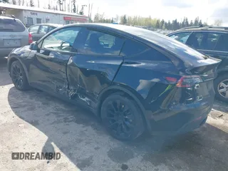 2022 Tesla Model Y Long Range with VIN 7SAYGDEEXNF459834, listed as a IAAI auction lot 42004576 with 56,175 mi miles and . Bid and sale history available at carsss.com. Image 3.