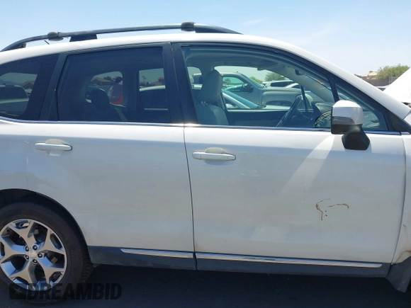 2015 Subaru Forester Touring with VIN JF2SJAWC8FH588321, listed as a IAAI auction lot 42689364 with 103,642 mi miles and . Bid and sale history available at DreamBid. Image 13.