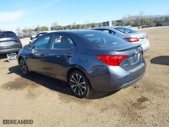 2019 Toyota Corolla L with VIN 5YFBURHE4KP905013, listed as a IAAI auction lot 41277148 with 74,138 mi miles. Bid and sale history available at carsss.com. Image 3.