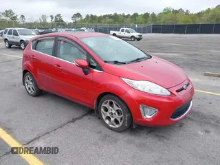 2011 Ford Fiesta SES with VIN 3FADP4FJ3BM204673, listed as a IAAI auction lot 41891902 with 145,967 mi miles. Bid and sale history available at carsss.com. Image 1.