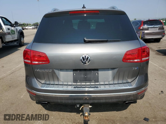 2015 Volkswagen Touareg Lux с VIN WVGEP9BP2FD004595, выставлен на аукционе Copart как лот 59020375 с пробегом 135 319 миль миль и Списание • Salvage title. История ставок и продаж доступна на DreamBid. Изображение 6.