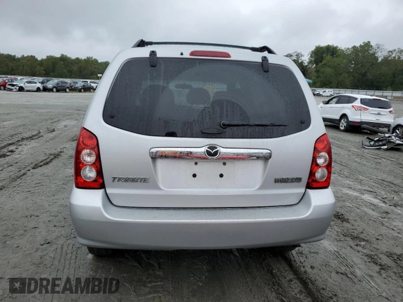 2006 Mazda Tribute i with VIN 4F2YZ02Z26KM14821, listed as a Copart auction lot 71718434 with 318,841 mi miles and Salvage Title. Bid and sale history available at carsss.com. Image 6.