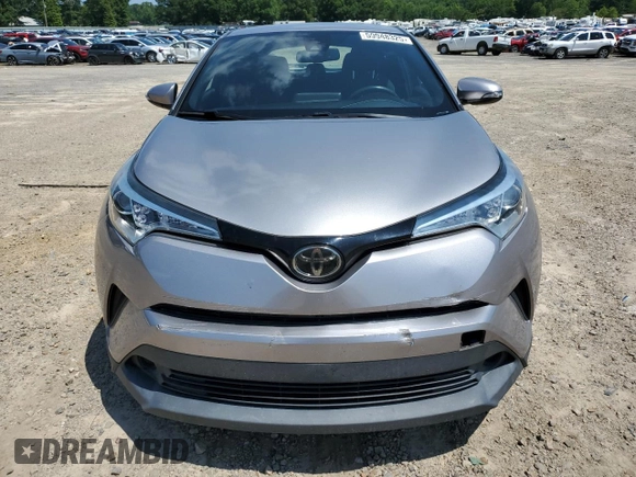 2018 Toyota C-HR XLE с VIN NMTKHMBX4JR062873, выставлен на аукционе Copart как лот 59948325 с пробегом 73 882 миль миль и Списание • Salvage title. История ставок и продаж доступна на DreamBid. Изображение 5.