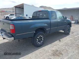 1996 Toyota T100 DX with VIN JT4UN22D9T0034196, listed as a IAAI auction lot 41969849 with 211,309 mi miles and . Bid and sale history available at carsss.com. Image 4.