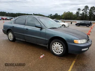 1996 Honda Accord EX with VIN 1HGCD5651TA188013, listed as a Copart auction lot 79533564 with 286,325 mi miles and Clean Title. Bid and sale history available at DreamBid. Image 4.