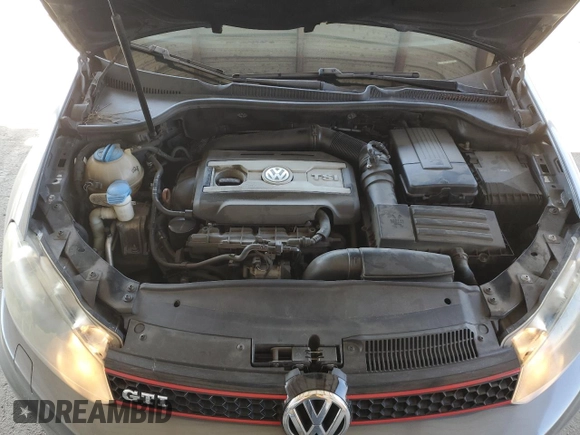 2013 Volkswagen GTI w/Conv & Sunroof z VIN WVWFD7AJ4DW031740, wystawiony jako Copart lot #70099084 z przebiegiem 130 193 mil mil oraz Szkoda całkowita • Salvage title. Historia ofert i sprzedaży dostępna na DreamBid. Obrazek 12.