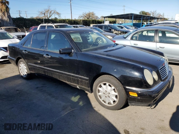1997 Mercedes-Benz E-Class with VIN WDBJF55F4VJ034892, listed as a Copart auction lot 89406595 with 118,494 mi miles and Salvage Title. Bid and sale history available at carsss.com. Image 4.
