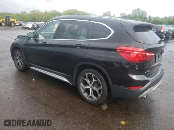 2018 BMW X1 xDrive28i with VIN WBXHT3C35J3H30946, listed as a Copart auction lot 55927505 with 69,626 mi miles and Salvage title. Bid and sale history available at DreamBid. Image 2.