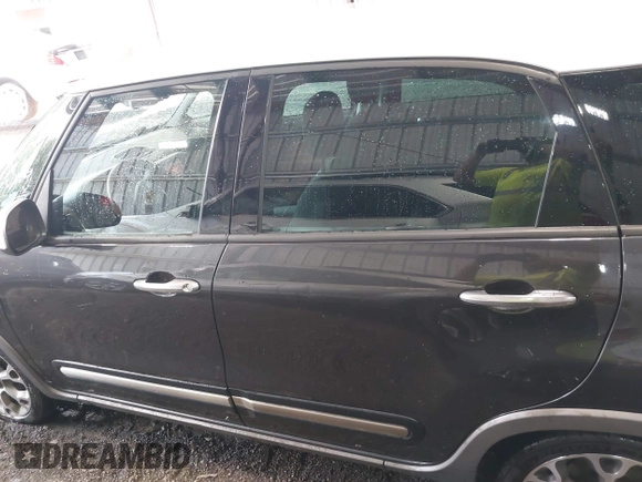 2014 FIAT 500L Trekking with VIN ZFBCFADH6EZ017800, listed as a IAAI auction lot 42572995 with 99,646 mi miles and . Bid and sale history available at DreamBid. Image 14.