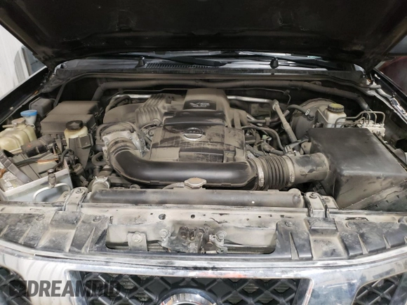 2012 Nissan Frontier SV with VIN 1N6AD0EV9CC450677, listed as a Copart auction lot 60173035 with 128,641 mi miles and Salvage title. Bid and sale history available at DreamBid. Image 11.