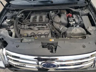 2009 Ford Taurus SE with VIN 1FAHP23W39G121125, listed as a Copart auction lot 80436544 with 122,908 mi miles and Clean Title. Bid and sale history available at carsss.com. Image 12.