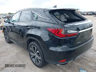 2021 Lexus RX 350 z VIN 2T2HZMAA8MC183615, wystawiony jako IAAI lot #42097557 z przebiegiem 56 470 mil mil oraz . Historia ofert i sprzedaży dostępna na DreamBid. Obrazek 3.