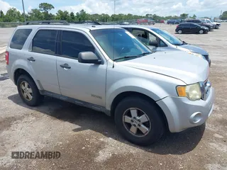 2008 Ford Escape XLT with VIN 1FMCU03Z58KE61718, listed as a IAAI auction lot 42611140 with 275,830 mi miles and . Bid and sale history available at DreamBid. Image 1.