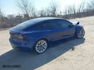 2022 Tesla Model 3 Long Range with VIN 5YJ3E1EB0NF191717, listed as a IAAI auction lot 41722202 with 67,811 mi miles. Bid and sale history available at carsss.com. Image 4.