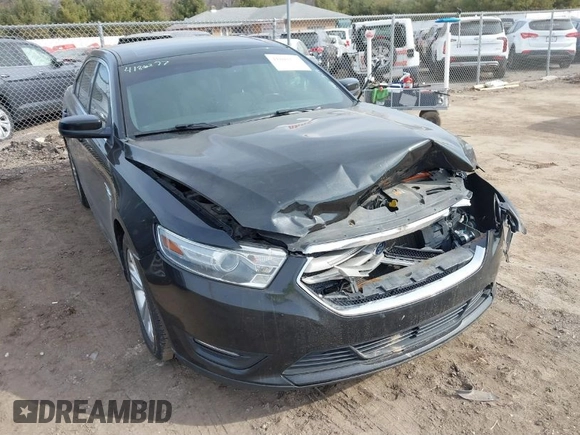 2013 Ford Taurus SEL with VIN 1FAHP2E84DG188503, listed as a IAAI auction lot 41800277 with 215,015 mi miles. Bid and sale history available at carsss.com. Image 1.