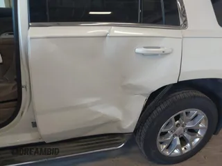 2015 GMC Yukon SLT z VIN 1GKS2BKC8FR109563, wystawiony jako IAAI lot #42194070 z przebiegiem 203 619 mil mil oraz . Historia ofert i sprzedaży dostępna na DreamBid. Obrazek 6.