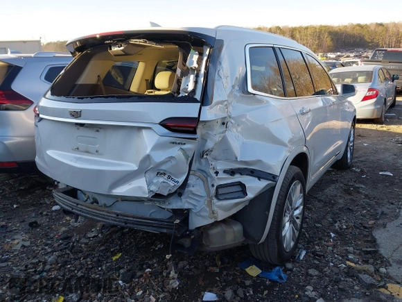 2020 Cadillac XT6 FWD Premium Luxury with VIN 1GYKPCRSXLZ207533, listed as a IAAI auction lot 41359744 with 81,689 mi miles. Bid and sale history available at carsss.com. Image 4.