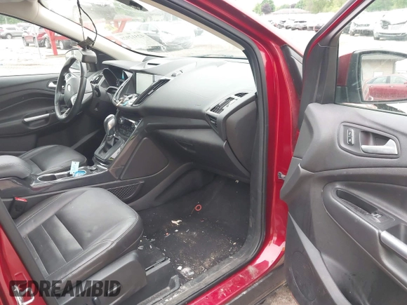 2015 Ford Escape Titanium with VIN 1FMCU9J96FUC02177, listed as a IAAI auction lot 42312928 with 100,716 mi miles and . Bid and sale history available at DreamBid. Image 5.