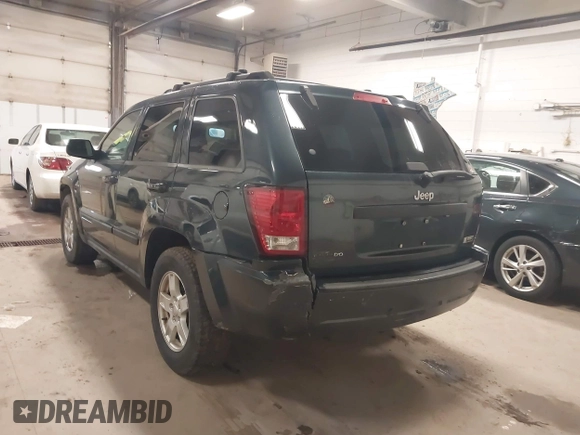 2007 Jeep Grand Cherokee Laredo with VIN 1J8GS48K87C615693, listed as a IAAI auction lot 41949521 with 206,058 mi miles. Bid and sale history available at carsss.com. Image 6.