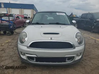 2011 MINI Hardtop S with VIN WMWSV3C58BTY11580, listed as a Copart auction lot 62081615 with 112,336 mi miles and Salvage title. Bid and sale history available at DreamBid. Image 5.
