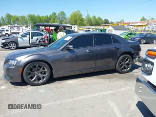 2022 Chrysler 300 S with VIN 2C3CCABG1NH259933, listed as a IAAI auction lot 42056429 with 51,327 mi miles and . Bid and sale history available at DreamBid. Image 14.