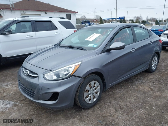 2015 Hyundai Accent GLS with VIN KMHCT4AE0FU929088, listed as a IAAI auction lot 41993359 with 149,958 mi miles. Bid and sale history available at carsss.com. Image 2.