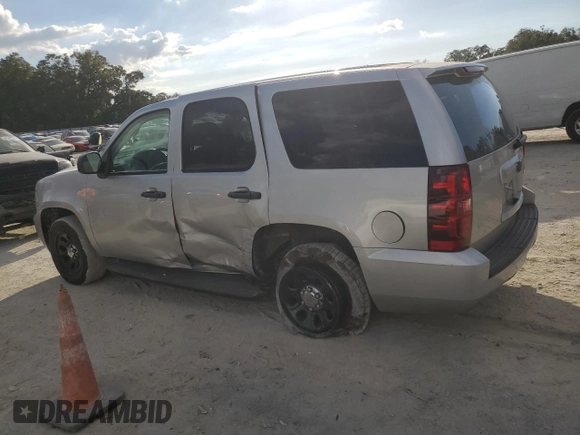 2011 Chevrolet Tahoe Commercial with VIN 1GNLC2E02BR306292, listed as a Copart auction lot 44136095 with 172,104 mi miles and Salvage title. Bid and sale history available at DreamBid. Image 2.