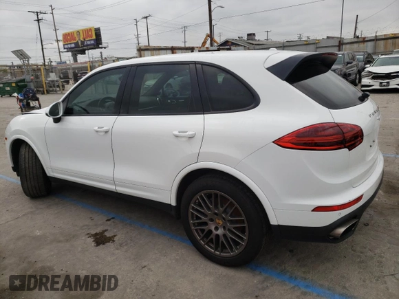 2017 Porsche Cayenne with VIN WP1AA2A24HKA81225, listed as a Copart auction lot 68863544 with 80,828 mi miles and Salvage title. Bid and sale history available at DreamBid. Image 2.