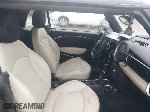 2013 MINI Convertible with VIN WMWZN3C53DT135492, listed as a IAAI auction lot 41436703 with 79,408 mi miles and . Bid and sale history available at DreamBid. Image 5.