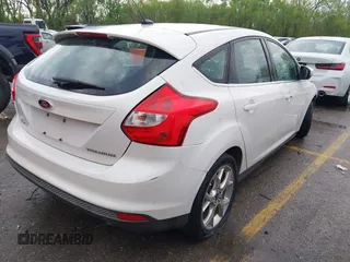 2012 Ford Focus Titanium with VIN 1FAHP3N29CL415935, listed as a IAAI auction lot 42004275 with 227,262 mi miles and . Bid and sale history available at carsss.com. Image 4.
