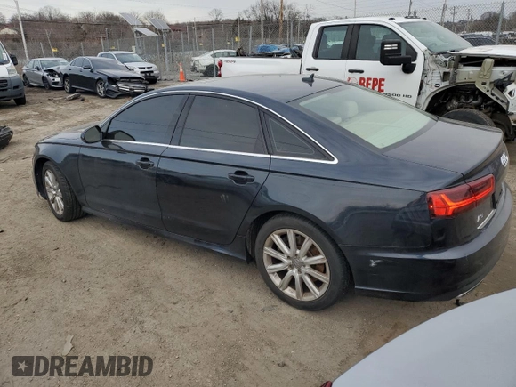 2016 Audi A6 2.0T Premium with VIN WAUCFAFC7GN085772, listed as a Copart auction lot 45504285 with 90,750 mi miles and Salvage Title. Bid and sale history available at carsss.com. Image 2.