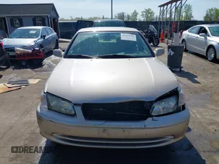 2001 Toyota Camry CE with VIN 4T1BG22K11U114688, listed as a IAAI auction lot 42065715 with 150,181 mi miles. Bid and sale history available at carsss.com. Image 12.