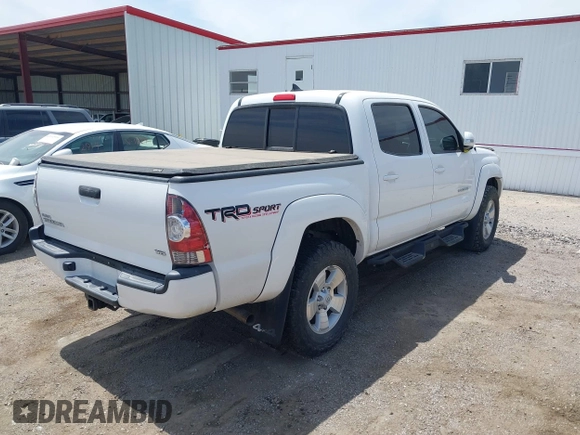 2015 Toyota Tacoma with VIN 3TMLU4EN2FM193142, listed as a IAAI auction lot 42189553 with 70,480 mi miles and . Bid and sale history available at DreamBid. Image 4.