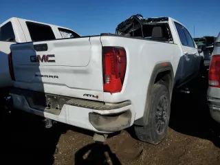 2023 GMC Sierra 3500HD AT4 z VIN 1GT49VEY3PF245031, wystawiony jako Copart lot #77260884 z przebiegiem Nie podano mil oraz Szkoda całkowita • Salvage title. Historia ofert i sprzedaży dostępna na DreamBid. Obrazek 3.