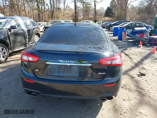 2014 Maserati Ghibli S Q4 with VIN ZAM57RTA1E1091738, listed as a IAAI auction lot 41518359 with 75,641 mi miles. Bid and sale history available at carsss.com. Image 16.