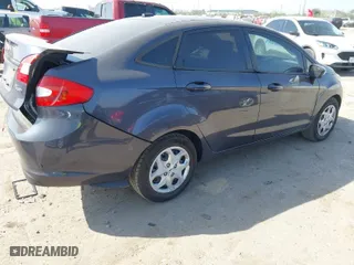 2012 Ford Fiesta SE with VIN 3FADP4BJ9CM180631, listed as a IAAI auction lot 41764566 with 103,554 mi miles. Bid and sale history available at carsss.com. Image 4.