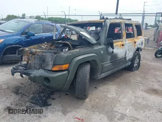 2007 Jeep Commander Sport with VIN 1J8HG48P07C584909, listed as a IAAI auction lot 42371885 with Not provided miles and . Bid and sale history available at DreamBid. Image 2.