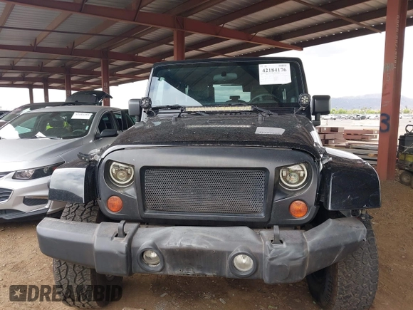 2008 Jeep Wrangler Unlimited Sahara with VIN 1J8GA59128L542384, listed as a IAAI auction lot 42184176 with 152,768 mi miles and . Bid and sale history available at DreamBid. Image 12.