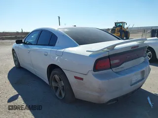 2014 Dodge Charger SXT with VIN 2C3CDXHG2EH104640, listed as a IAAI auction lot 41379760 with 122,664 mi miles and . Bid and sale history available at DreamBid. Image 3.
