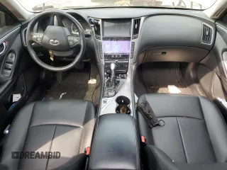 2015 Infiniti Q50 Premium with VIN JN1BV7ARXFM421115, listed as a Copart auction lot 60875545 with 84,549 mi miles and Salvage title. Bid and sale history available at DreamBid. Image 8.