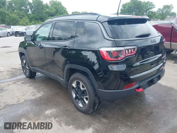 2018 Jeep Compass Trailhawk z VIN 3C4NJDDB1JT264032, wystawiony jako IAAI lot #42524893 z przebiegiem 96 399 mil mil oraz . Historia ofert i sprzedaży dostępna na DreamBid. Obrazek 3.