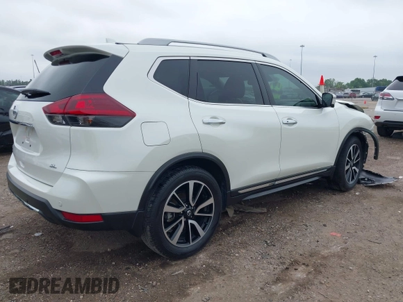 2020 Nissan Rogue S with VIN 5N1AT2MT0LC751724, listed as a IAAI auction lot 41870342 with 33,920 mi miles and . Bid and sale history available at DreamBid. Image 4.