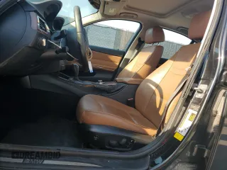 2009 BMW 3 Series 328i xDrive with VIN WBAPK73559A456475, listed as a Copart auction lot 62363865 with 169,125 mi miles and Salvage title. Bid and sale history available at DreamBid. Image 7.