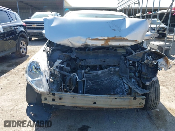 2016 Nissan Versa SV z VIN 3N1CN7AP6GL830257, wystawiony jako IAAI lot #41866021 z przebiegiem 129 051 mil mil oraz . Historia ofert i sprzedaży dostępna na DreamBid. Obrazek 13.