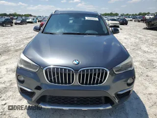 2017 BMW X1 sDrive28i with VIN WBXHU7C32HP925374, listed as a Copart auction lot 54820225 with 136,708 mi miles and Clean Title. Bid and sale history available at carsss.com. Image 5.