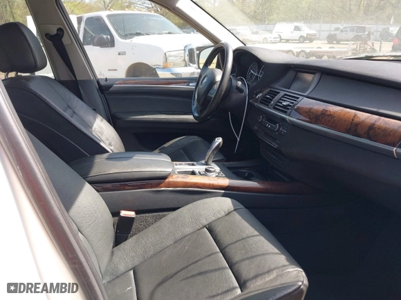 2011 BMW X5 35i with VIN 5UXZV4C54BL410338, listed as a IAAI auction lot 41930266 with 148,950 mi miles. Bid and sale history available at carsss.com. Image 5.
